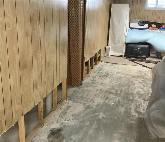Basement with flood cut walls and concrete floor