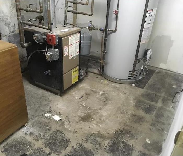Dried basement floors with a boiler and water heater